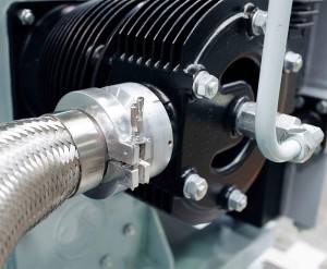 Mechanical connection at the crankshaft  of either double Lip Seal or Magnetic Coupling Drive to esnure hermetic gas-tightness